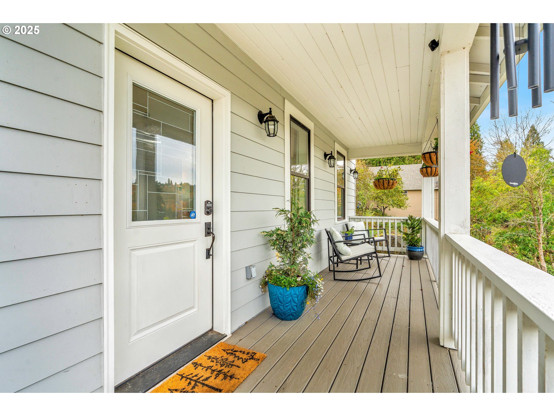 704 3rd Avenue Oregon City, OR 97045 - Photo 7 of 48 a view of a balcony with chairs and a potted plant