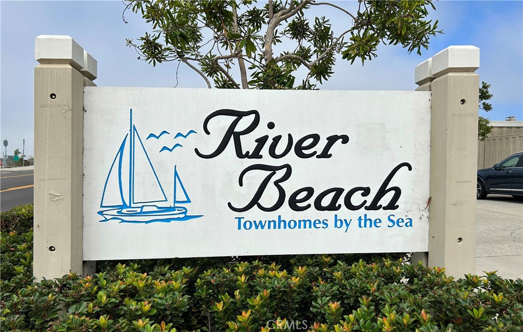 a sign that is on the side of the building