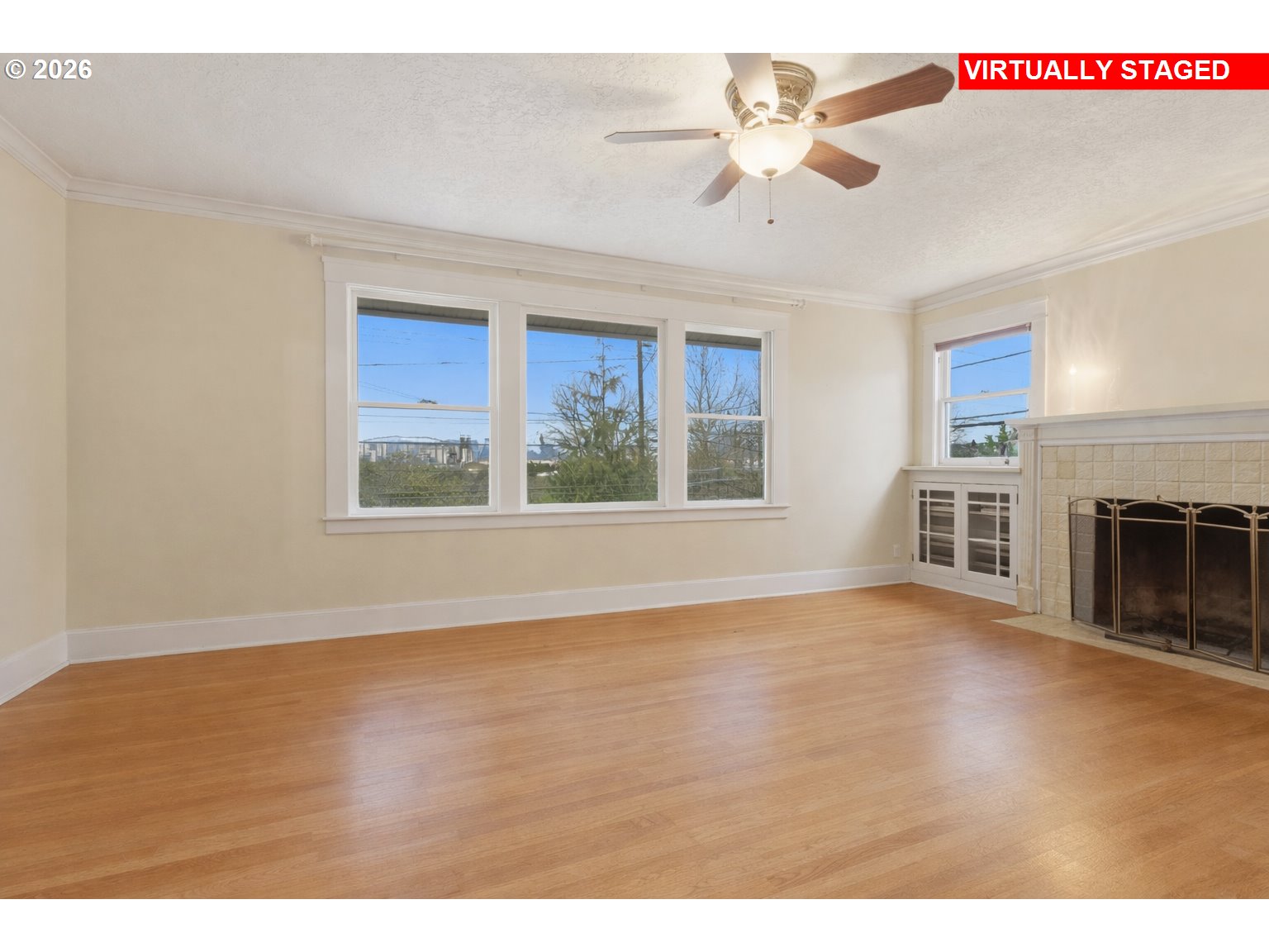 706 West B Street Rainier, OR 97048 - Photo 4 of 47 a view of an empty room with a window and a kitchen view