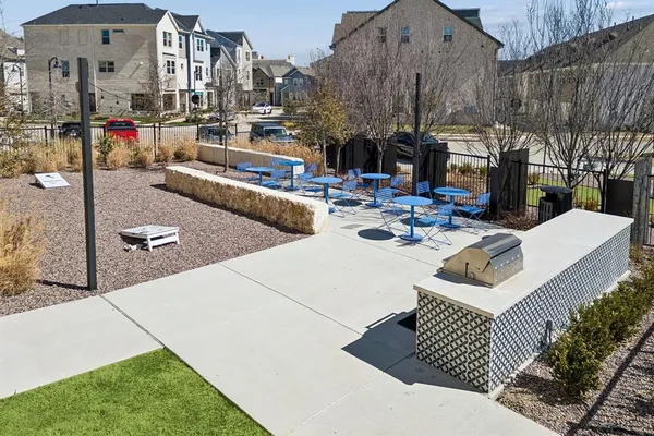 a view of barbeque area and outdoor seating