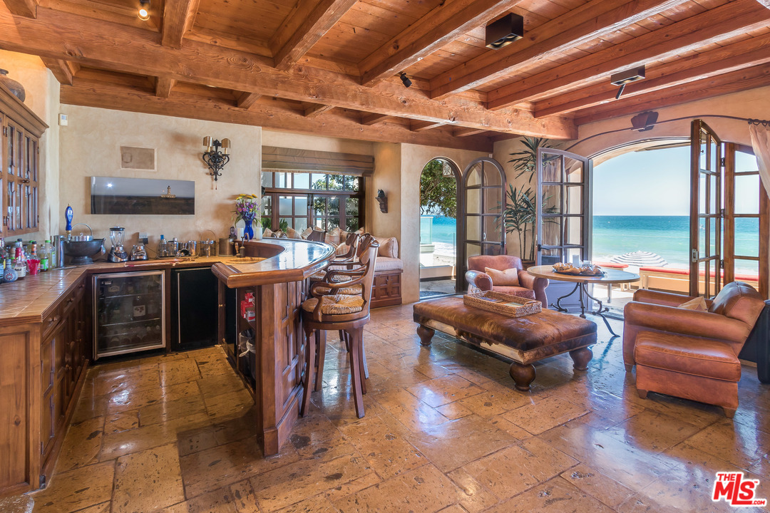 22102 Pacific Coast Highway Malibu, CA 90265 - Photo 14 of 36 a outdoor space with lots of furniture and tub