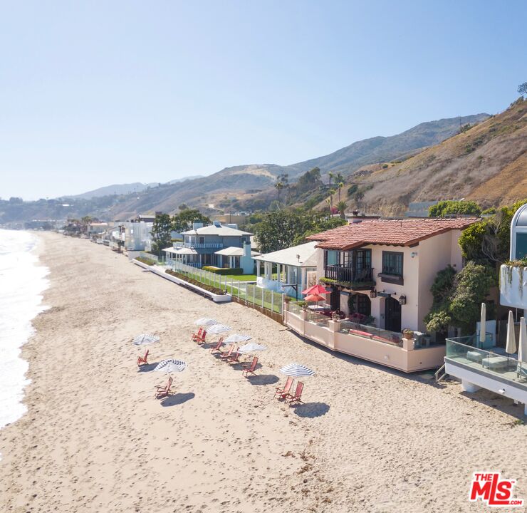 22102 Pacific Coast Highway Malibu, CA 90265 - Photo 2 of 36 a view of a house with a yard