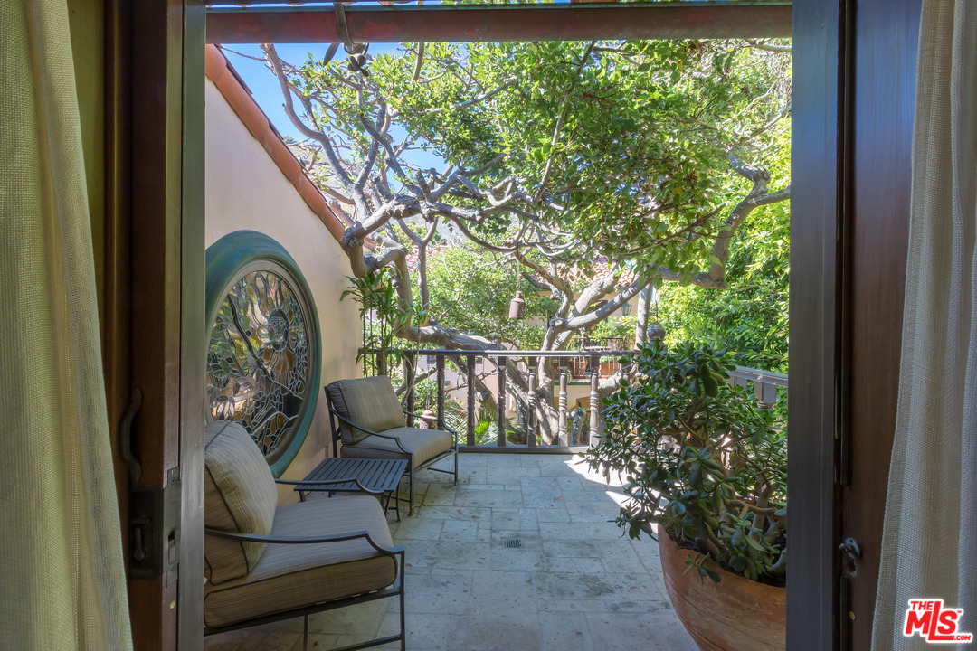 22102 Pacific Coast Highway Malibu, CA 90265 - Photo 25 of 36 a view of two chairs in the balcony