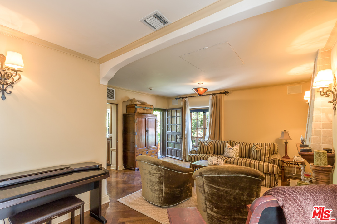 22102 Pacific Coast Highway Malibu, CA 90265 - Photo 30 of 36 a living room with furniture and a large window