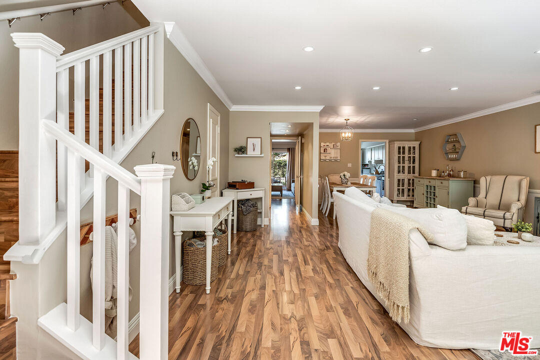 4443 Saugus Avenue, Unit 3 Sherman Oaks, CA 91403 - Photo 6 of 35 a living room with furniture and a wooden floor