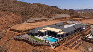 1141 East Lost Ridge Drive Washington, UT 84780 - Photo 6 of 108 Contemporary residence featuring a private pool and surrounding paved patio