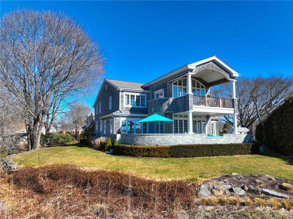 3 Seawatch Drive Westbrook, CT 06498 - Photo 1 of 40 a front view of a house with a yard