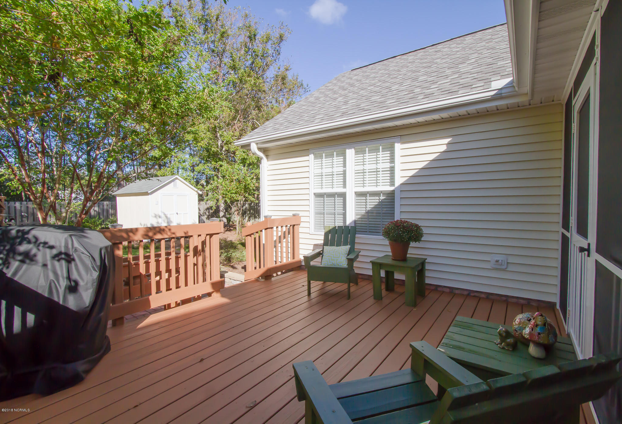 5110 Long Pointe Road Wilmington, NC 28409 - Photo 27 of 34 Deck right off the screened porch