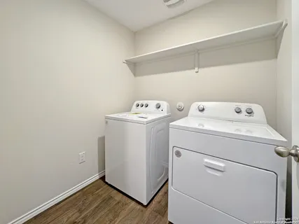 a utility room with dryer and washer