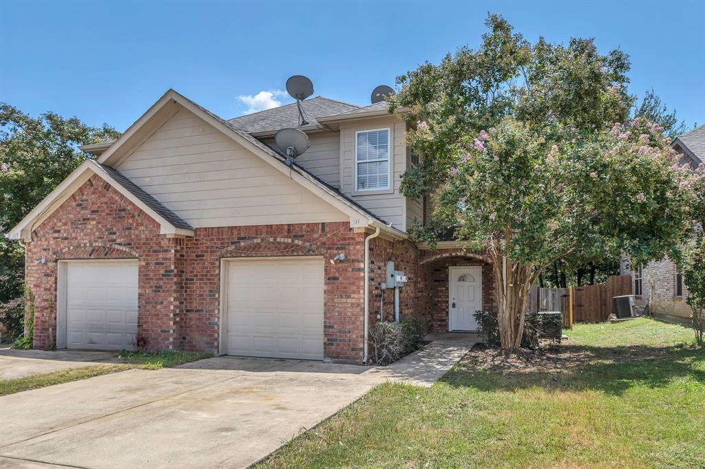 711 Parkplace Ridge Princeton, TX 75407 - Photo 1 of 15 a view of a house with a yard and large tree