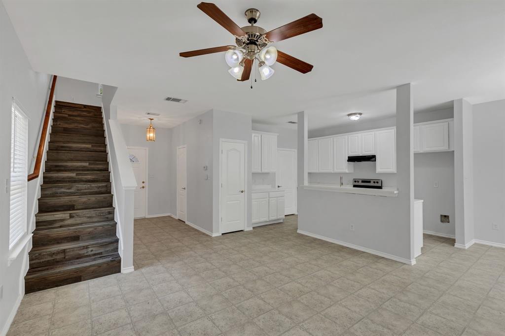 711 Parkplace Ridge Princeton, TX 75407 - Photo 5 of 15 a view of an empty room with closet and a ceiling fan
