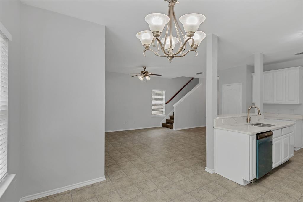 711 Parkplace Ridge Princeton, TX 75407 - Photo 7 of 15 a view of a hallway with chandelier