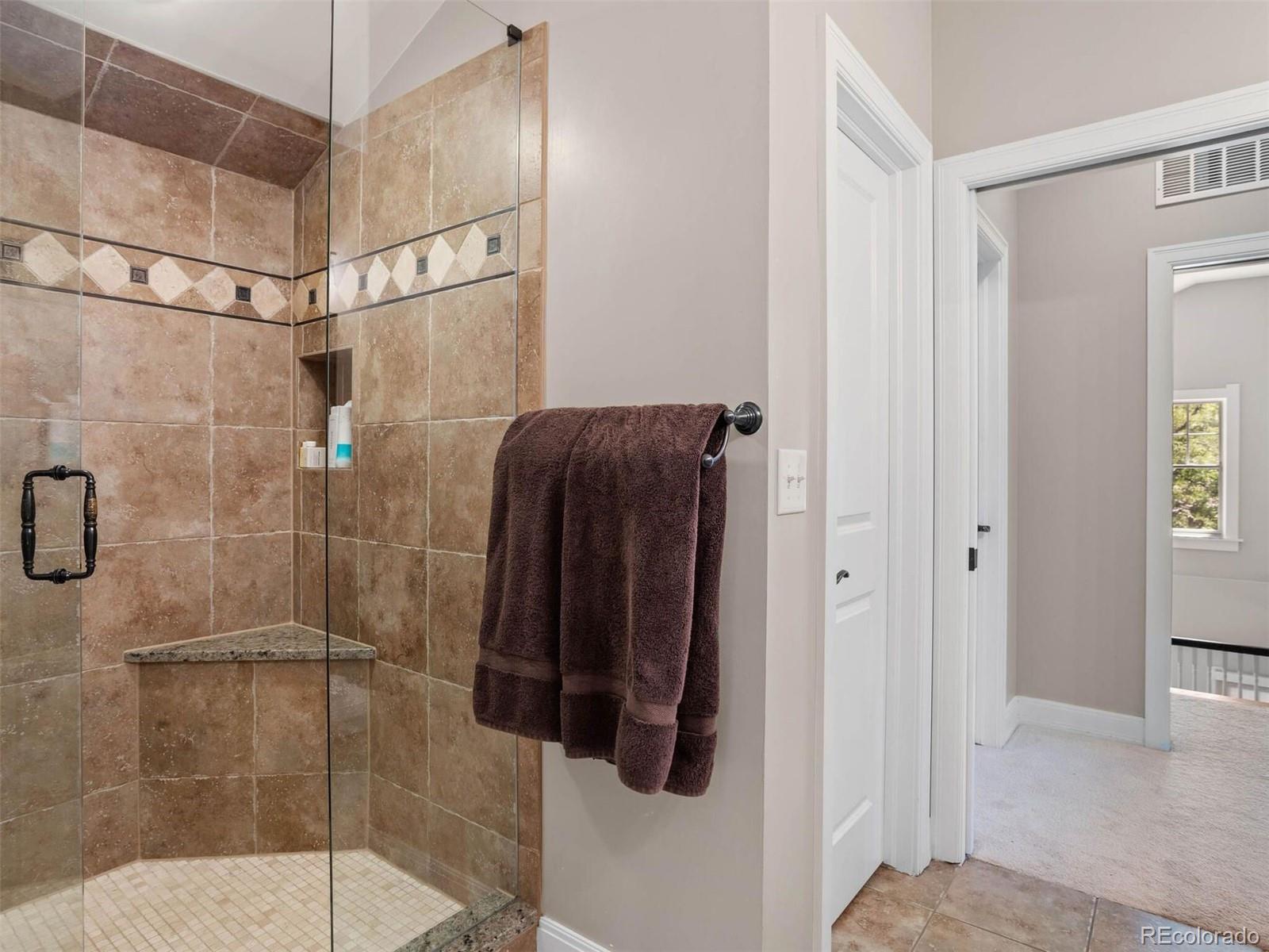 643 Jackson Street Denver, CO 80206 - Photo 28 of 40 a bathroom with a shower