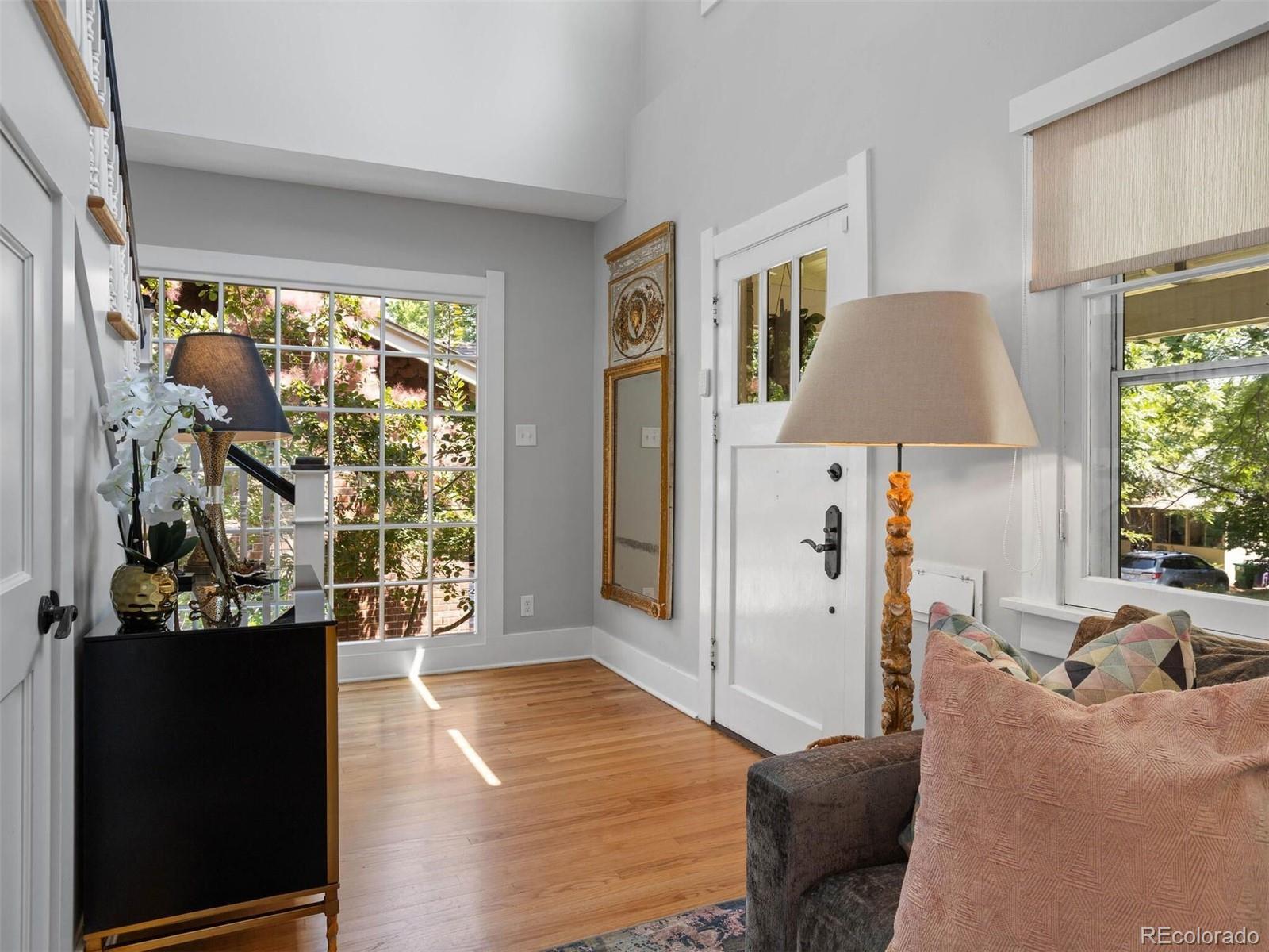 643 Jackson Street Denver, CO 80206 - Photo 5 of 40 a bedroom with furniture and a window