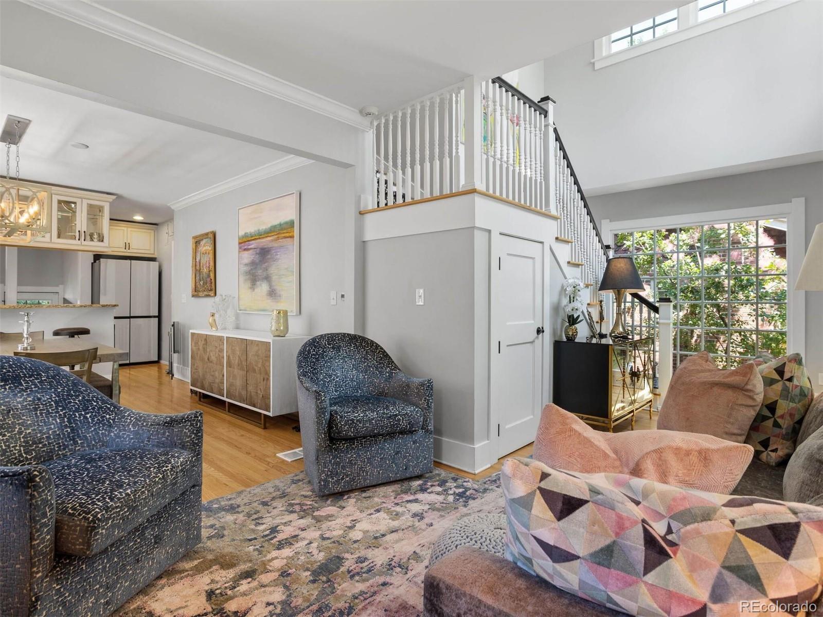 643 Jackson Street Denver, CO 80206 - Photo 10 of 40 a living room with furniture and a table