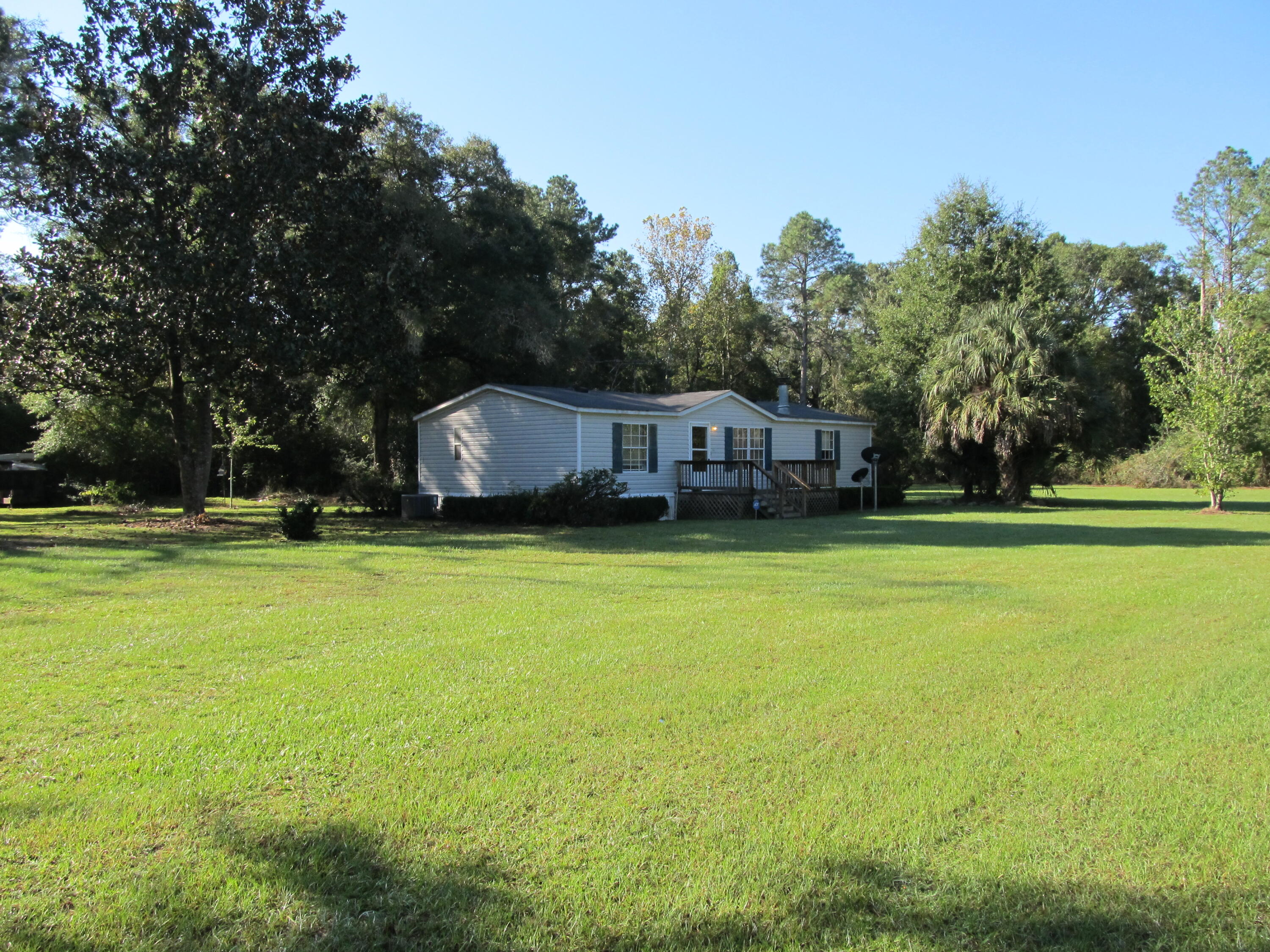 211 River Road Samson, AL 36477 - Photo 19 of 23 a view of a house with a big yard