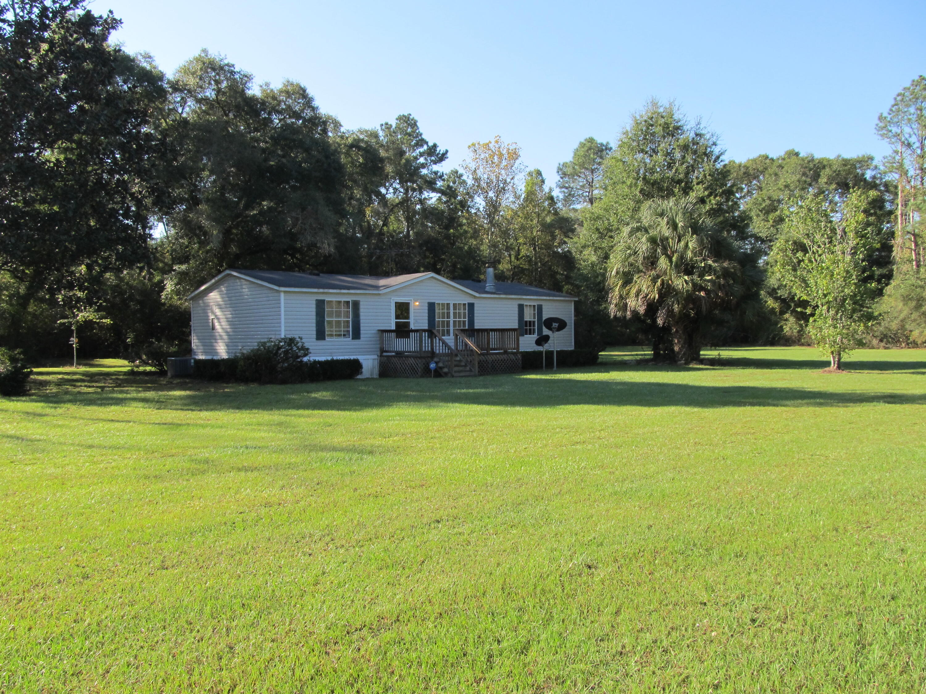 211 River Road Samson, AL 36477 - Photo 23 of 23 a view of a house with a big yard