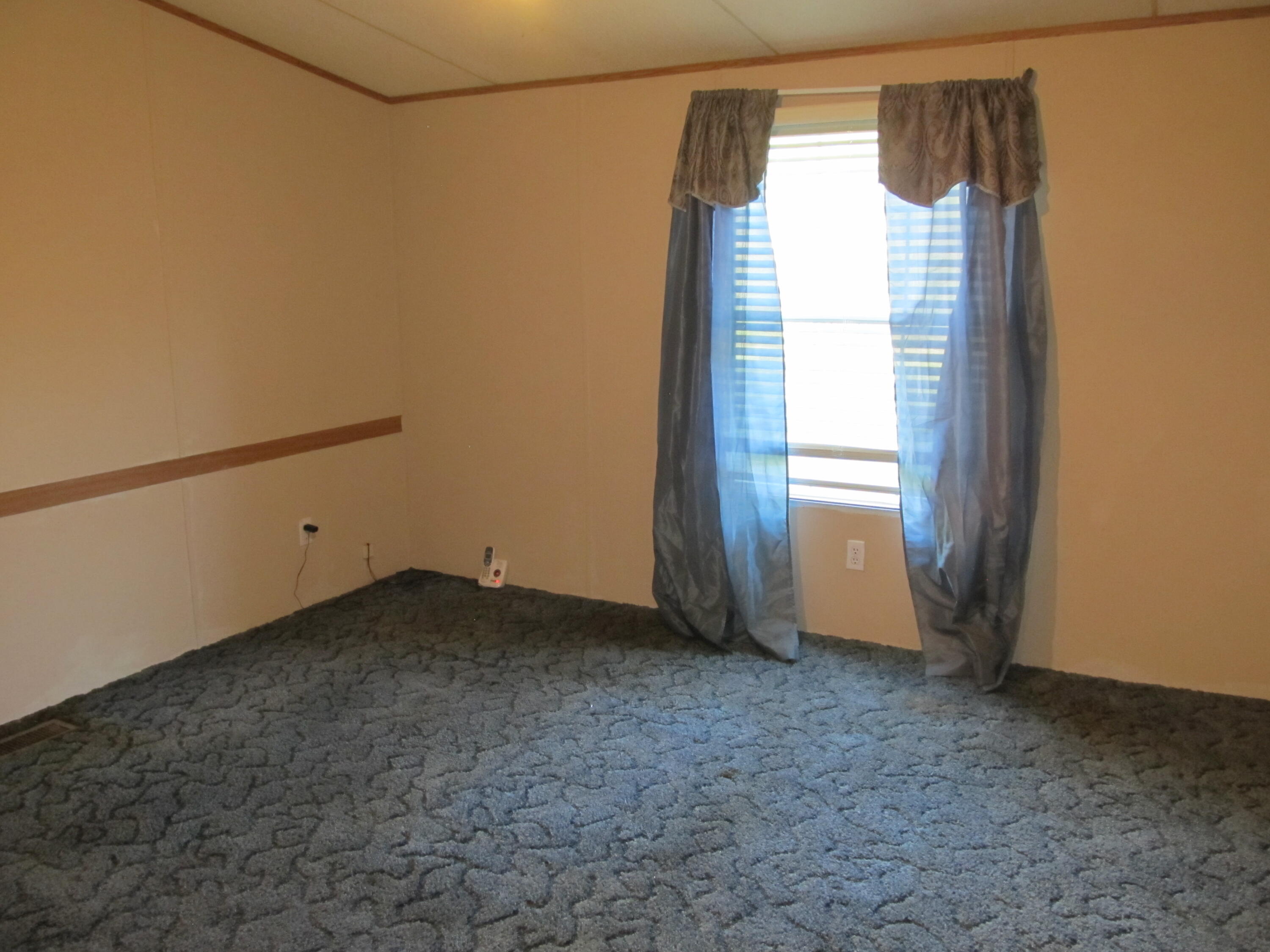 211 River Road Samson, AL 36477 - Photo 8 of 23 a view of a room with a window