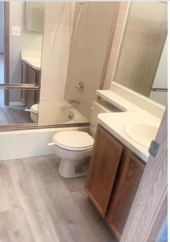 a bathroom with a sink and toilet