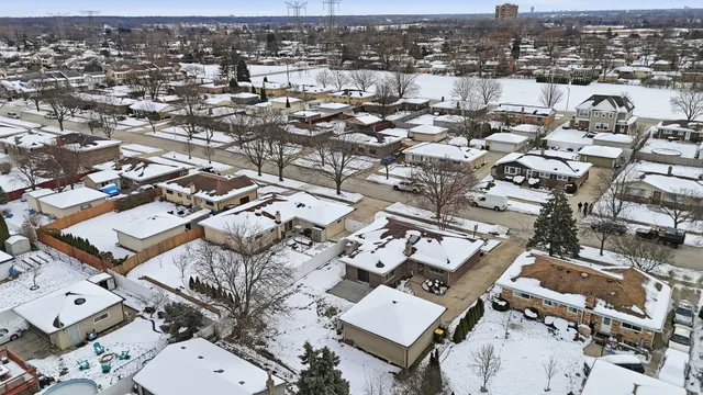 an aerial view of a city with lots of residential buildings