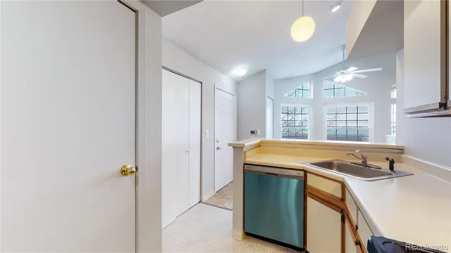 a spacious bathroom with a tub and window