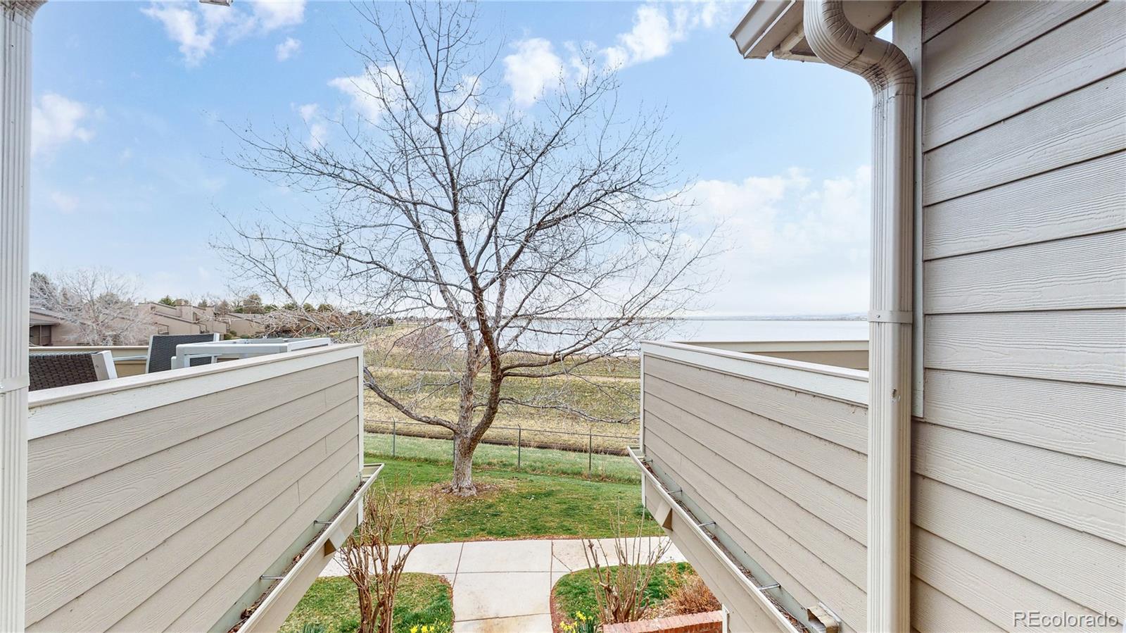4760 South Wadsworth Boulevard, Unit F208 Littleton, CO 80123 - Photo 21 of 30 a view of a balcony with an outdoor space