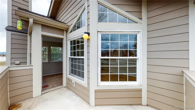 a view of front door and bedroom