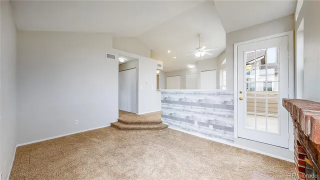 en empty room with windows