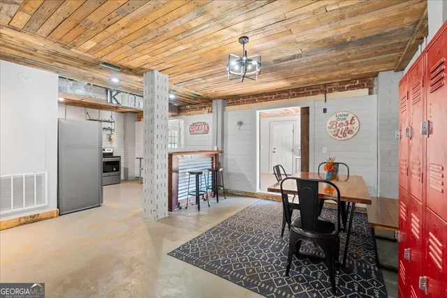 a kitchen with a stove and a microwave