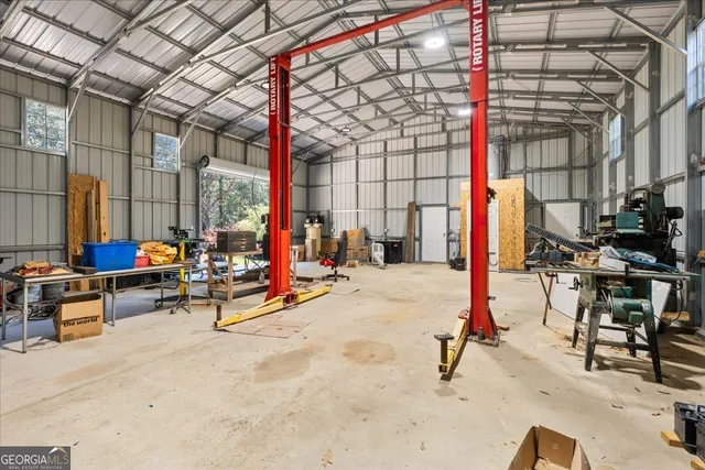 a view of a chairs and tables in patio