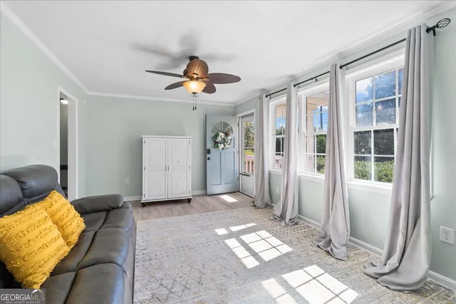 a view of livingroom with furniture and window
