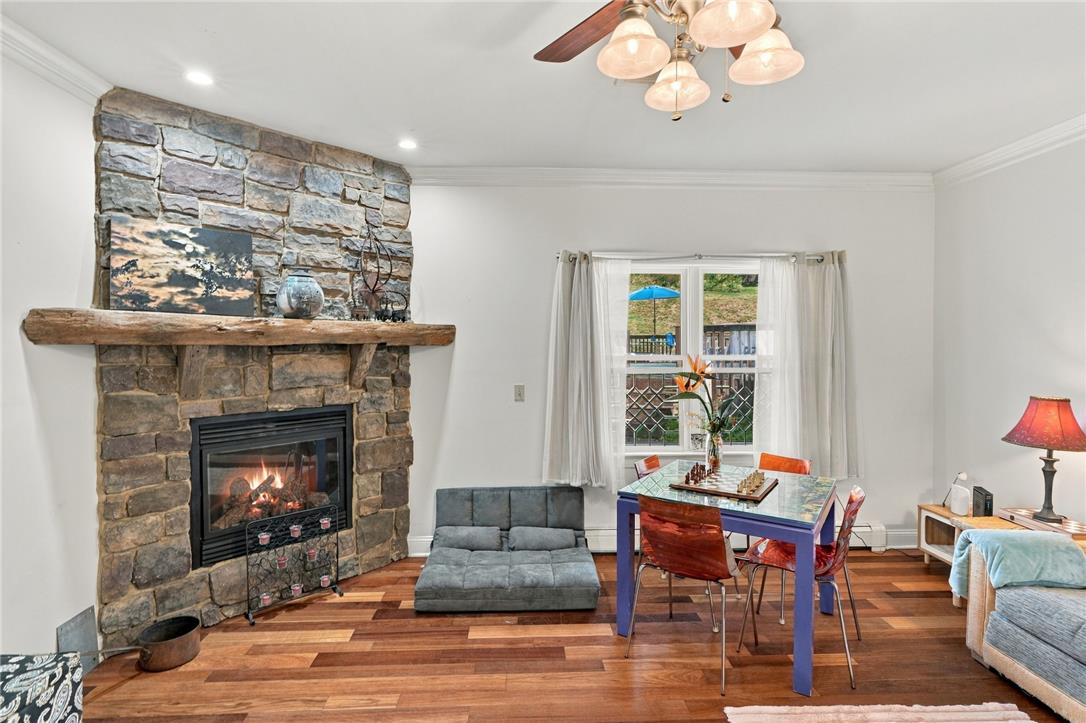 1255 Clearview Road Coplay, PA 18037 - Photo 23 of 54 Rich hardwood floors complement a towering stone fireplace with a thick timber mantel.