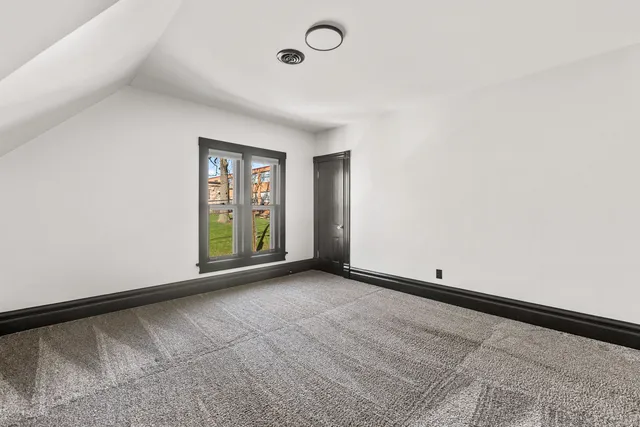 a view of an empty room with window