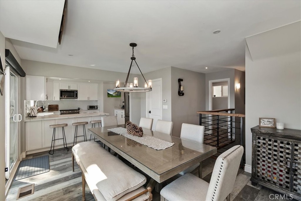 27565 North Bay Road Lake Arrowhead, CA 92352 - Photo 12 of 58 a view of a dining room with furniture
