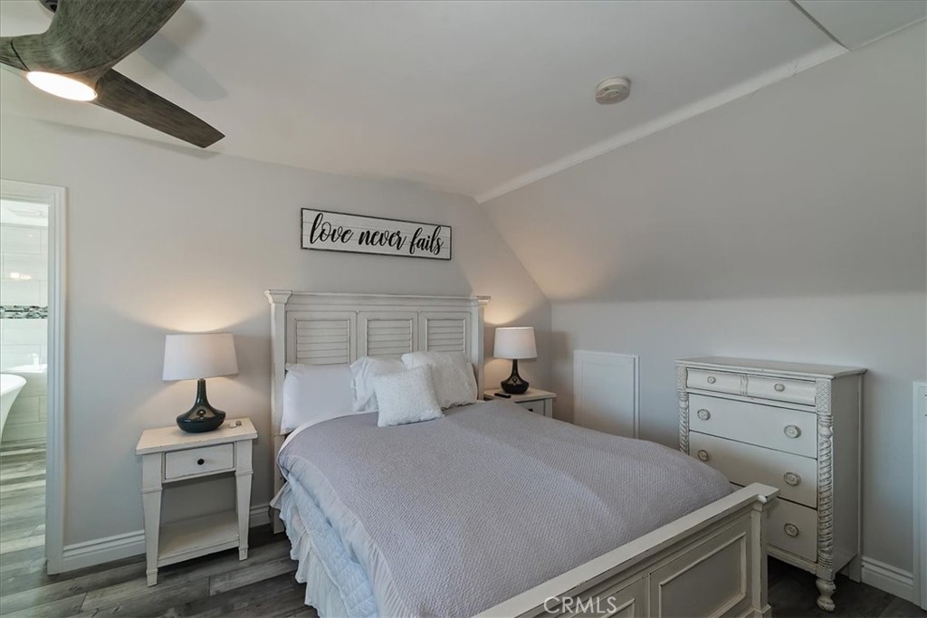 27565 North Bay Road Lake Arrowhead, CA 92352 - Photo 19 of 58 a bedroom with a bed and a night stand