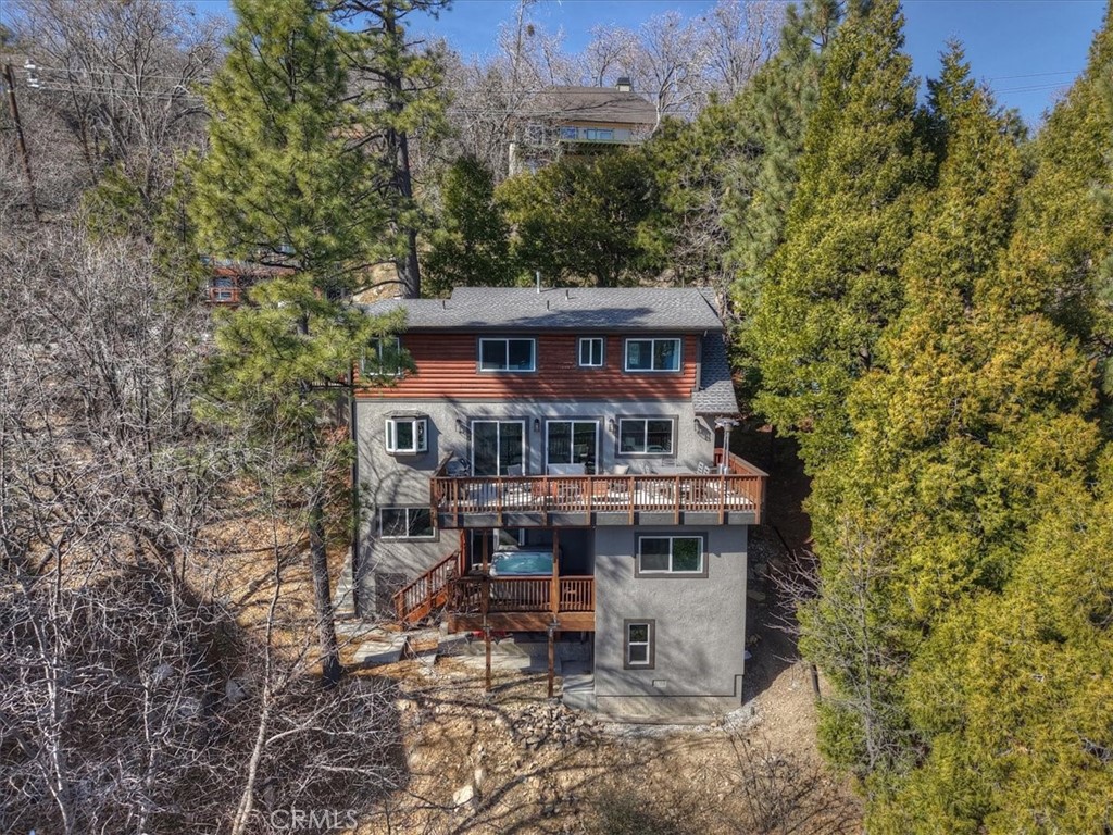 27565 North Bay Road Lake Arrowhead, CA 92352 - Photo 4 of 58 a view of a house with a roof deck