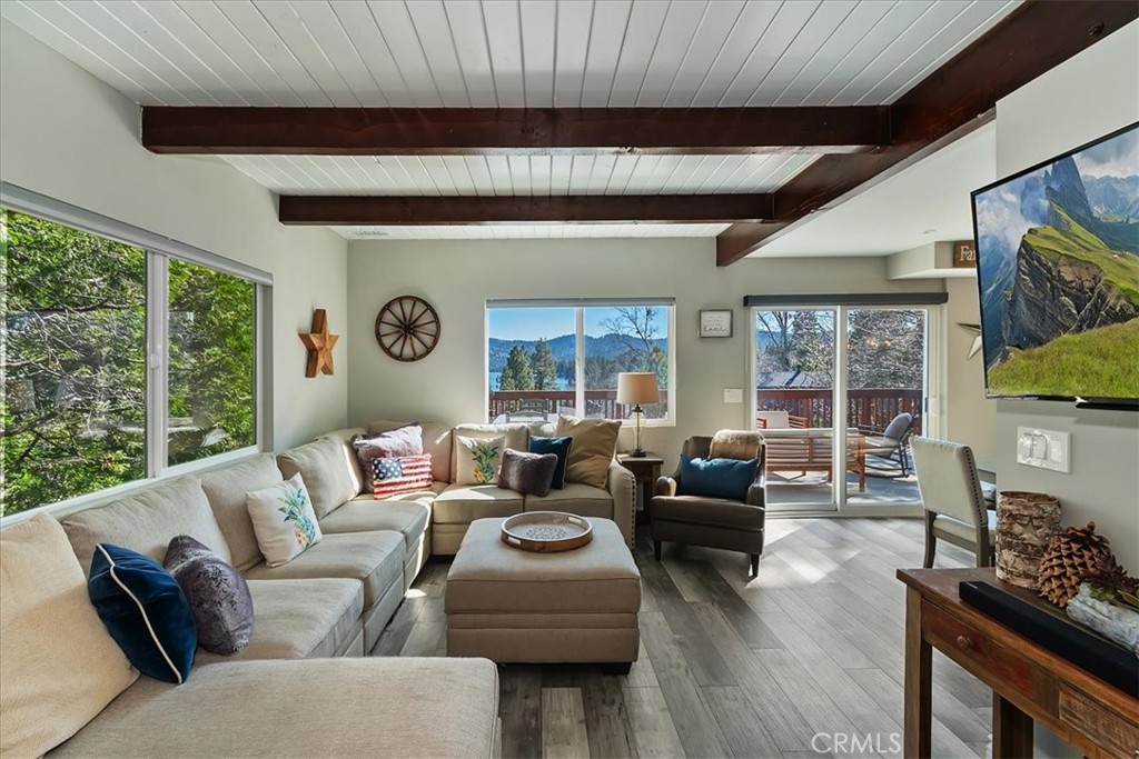 27565 North Bay Road Lake Arrowhead, CA 92352 - Photo 8 of 58 a living room with furniture and a large window