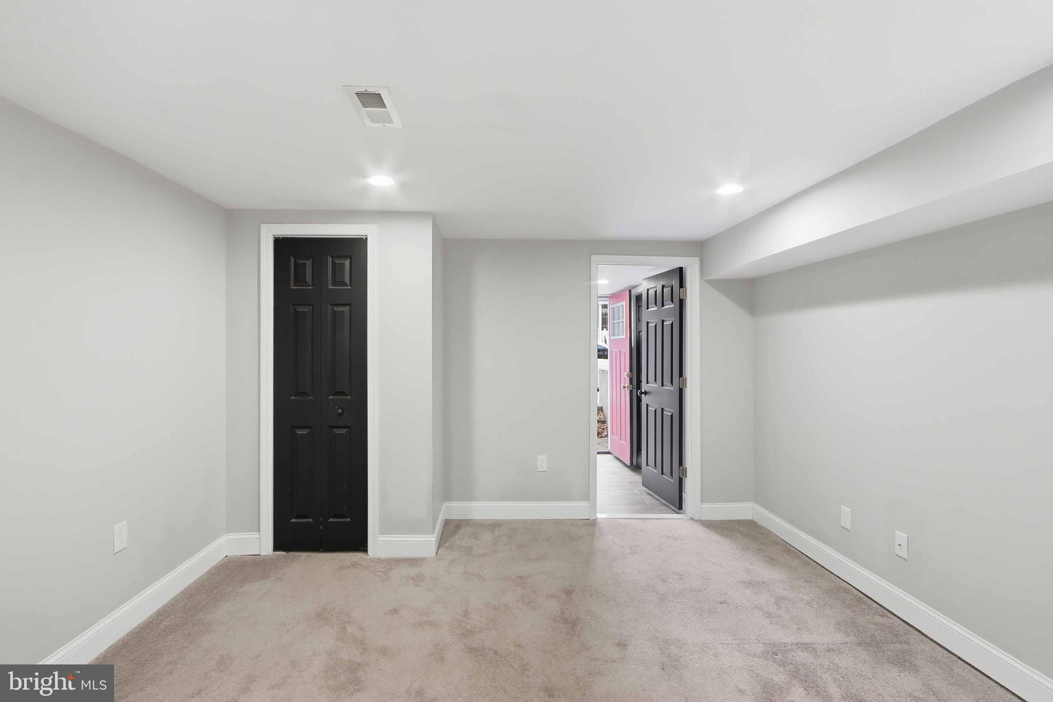 3540 Keswick Road Baltimore, MD 21211 - Photo 34 of 41 an empty room with closet and entryway