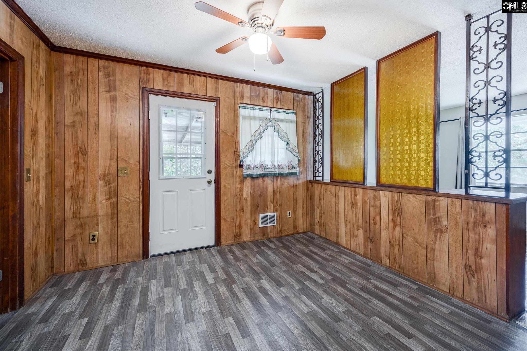 5666 Middleton Court Columbia, SC 29203 - Photo 13 of 42 wooden floor in an empty room with a window