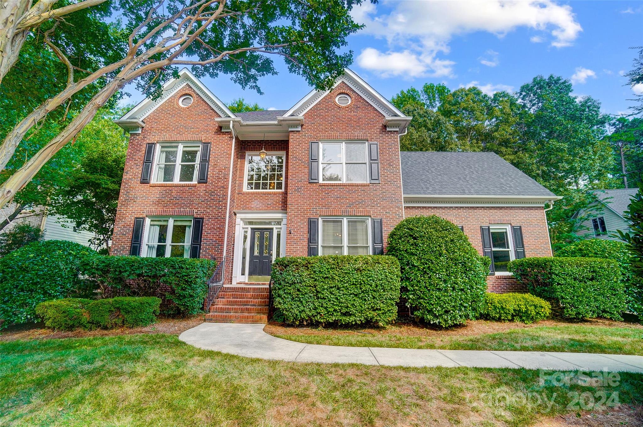 15110 MacBeth Court Huntersville, NC 28078 - Photo 1 of 36 a front view of a house with a yard