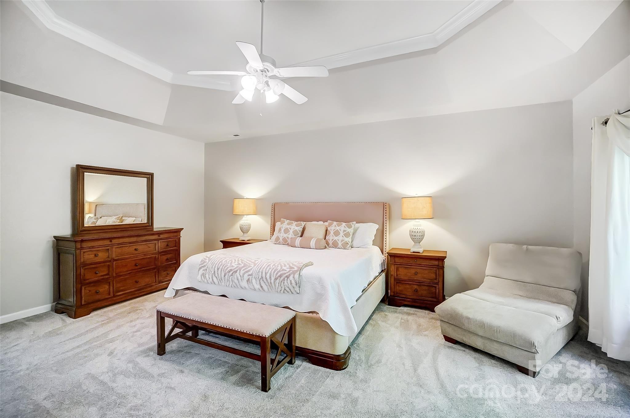 15110 MacBeth Court Huntersville, NC 28078 - Photo 15 of 36 a bedroom with a bed and a dresser