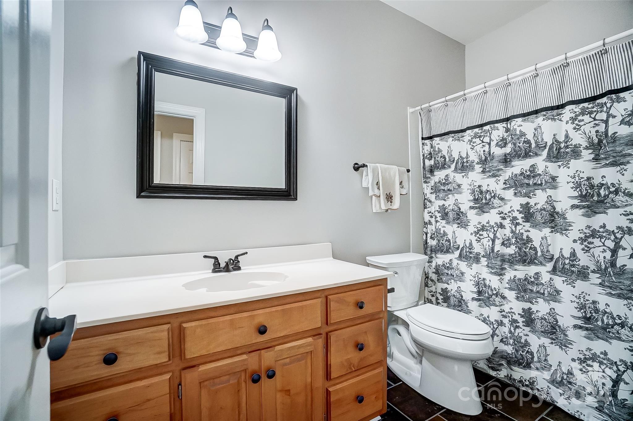 15110 MacBeth Court Huntersville, NC 28078 - Photo 22 of 36 a bathroom with a sink toilet and shower