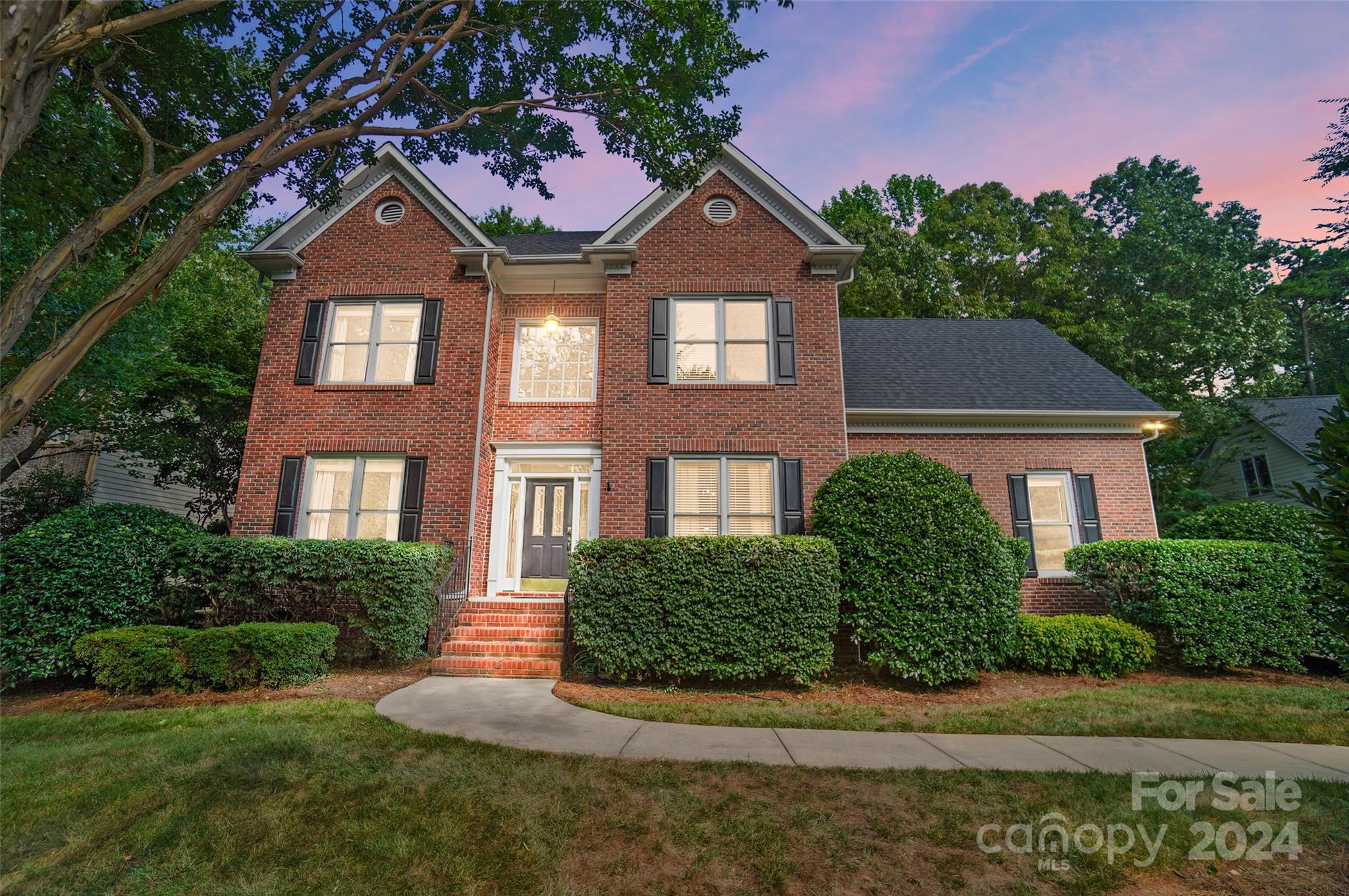 15110 MacBeth Court Huntersville, NC 28078 - Photo 27 of 36 a front view of a house with a yard