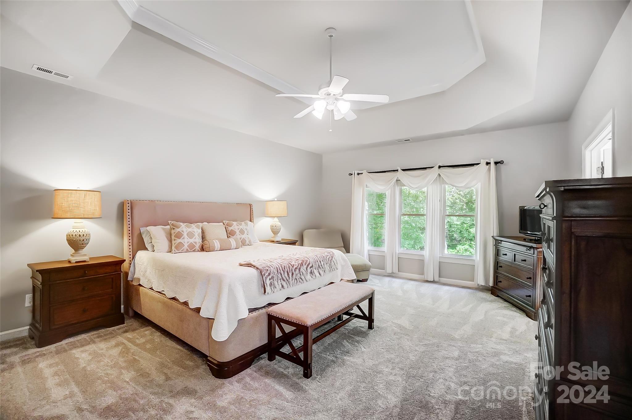15110 MacBeth Court Huntersville, NC 28078 - Photo 3 of 36 a bedroom with a bed dresser and a window