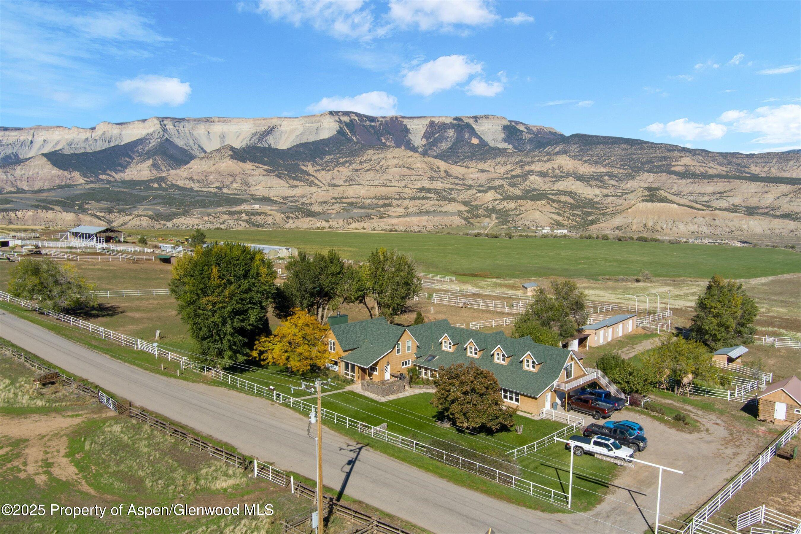 7781 County Road 320 Rifle, CO 81650 - Photo 1 of 63 a view of a lake with a mountain