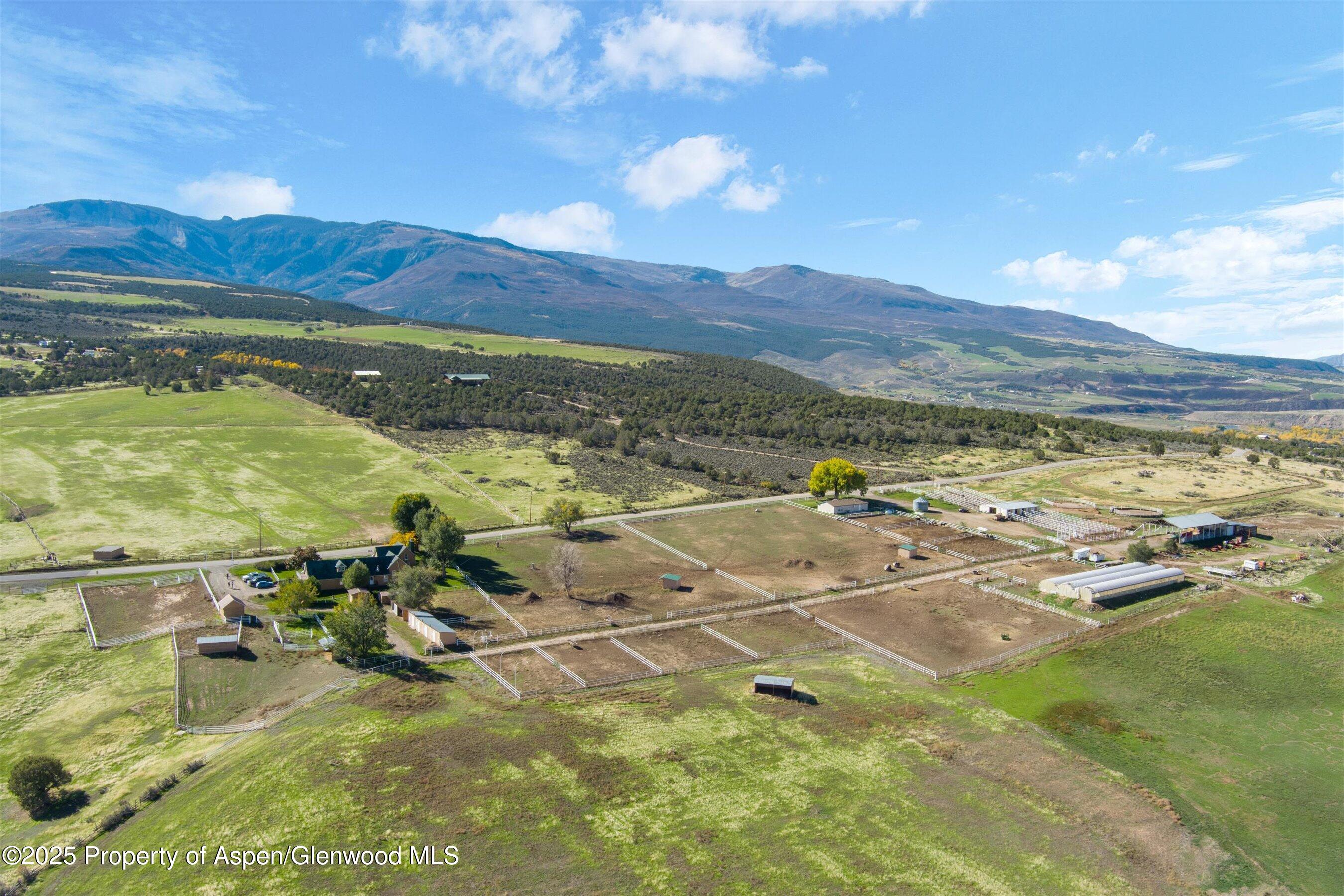 7781 County Road 320 Rifle, CO 81650 - Photo 13 of 63 a view of a swimming pool with an ocean view
