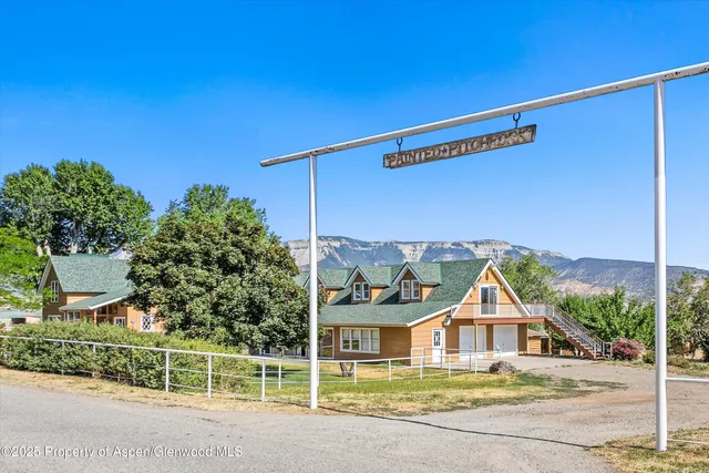 a bedroom with a bed and a dresser in it