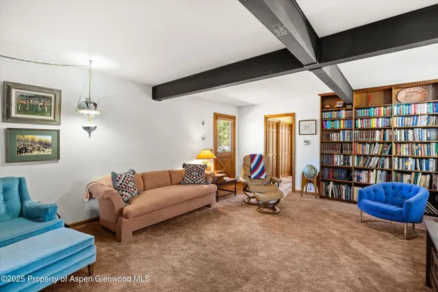 a living room with a couch and a table