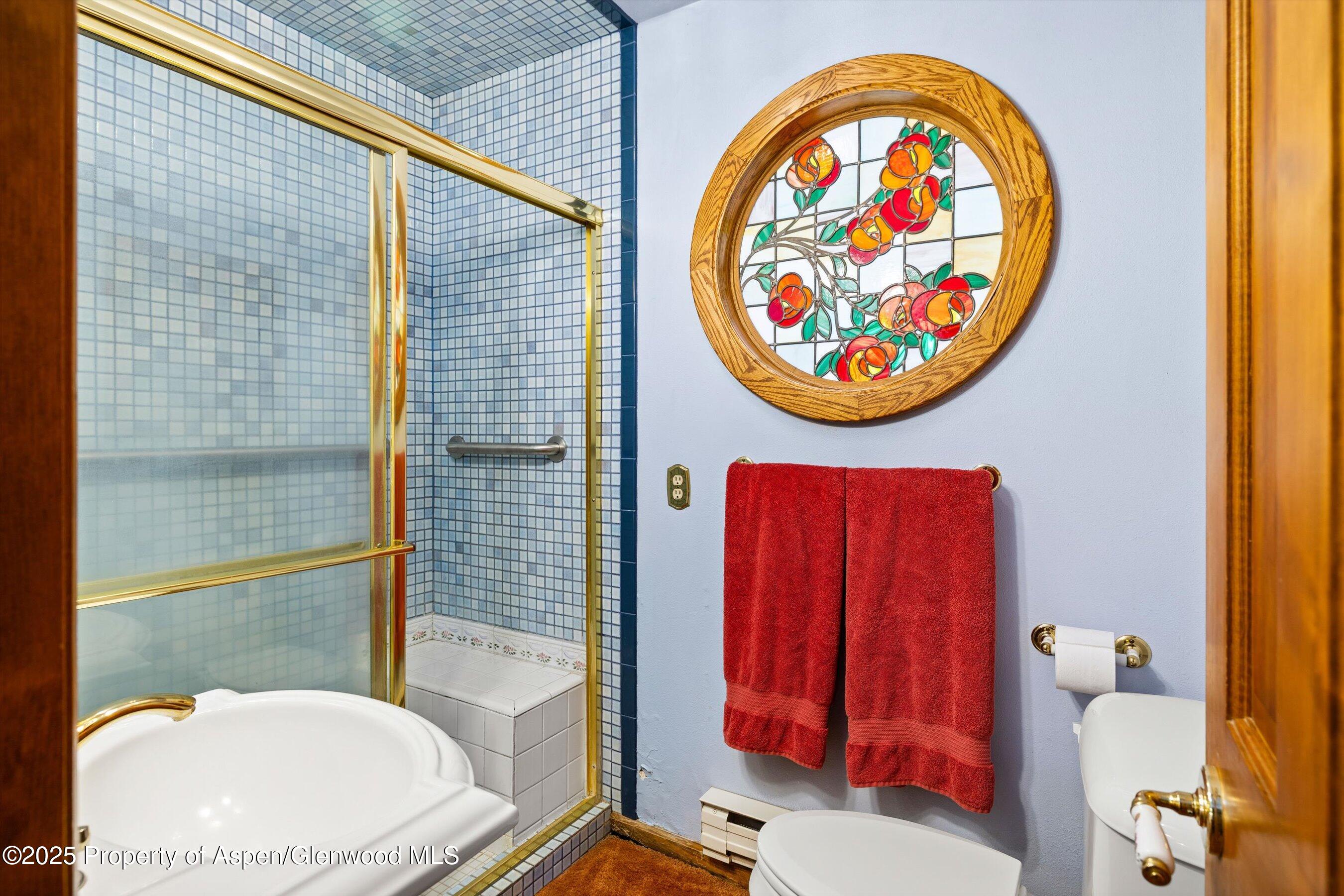 7781 County Road 320 Rifle, CO 81650 - Photo 43 of 63 a bathroom with a toilet and a sink