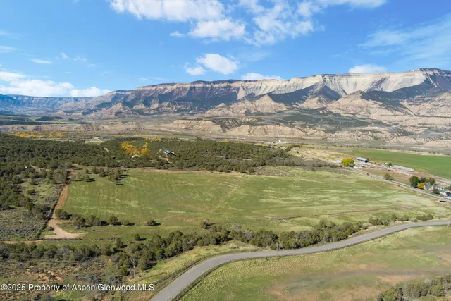 a view of a swimming pool with an ocean view